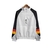 Jaqueta Corta-Vento Real Madrid 23/24 - Masculina Adidas - Branca com detalhes em vermelho e preto e amarelo