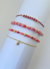 Mix de pulseras bordó con cristales, fimo y dijes de estrella en hilo y cadena de oro laminado 