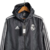 Jaqueta Corta-Vento Real Madrid 23/24 Masculino Adidas - Preto - loja online