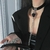 Chocker com pingente de coração