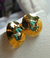 Aretes bronce martillado con baño en oro