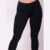 Calzas deportivas negras para mujer, ajustadas y cómodas, ideales para el ejercicio.