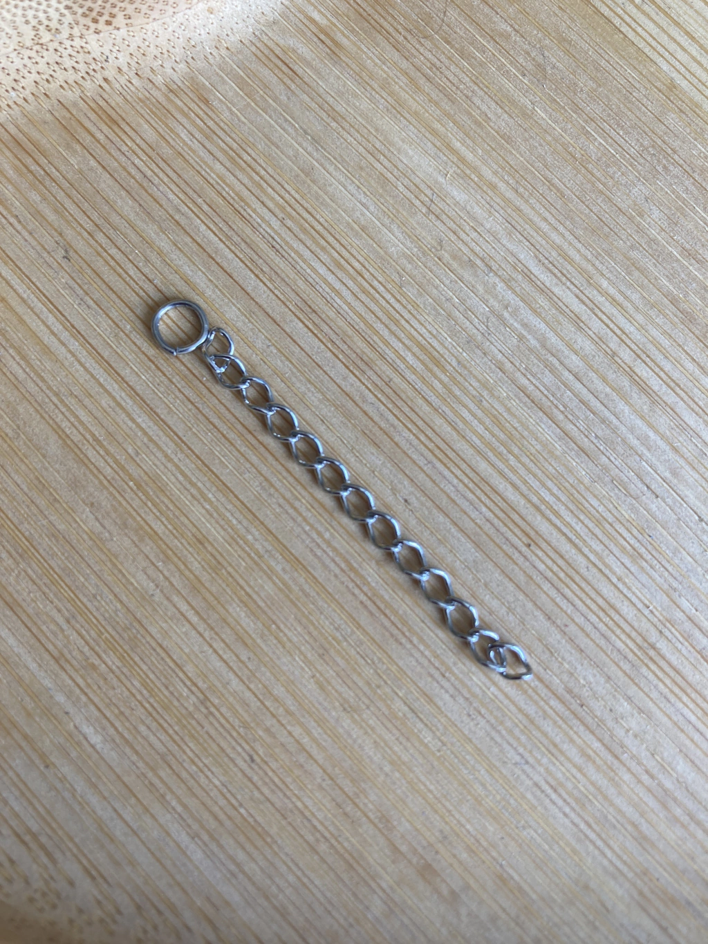 Extensor de colares em aço
