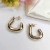 Brinco Argola Aberta Tubo Oval M Banhado A Ouro 18k