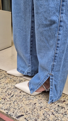 Calça Wide Leg Jeans Médio Marmorizada com Fenda na internet