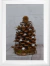 Customização de pinha seca para mini árvore de Natal com musgo e adornos perolados, ideal para enfeitar a casa nas festas de fim de ano.