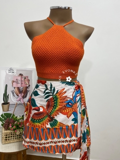 Perfeito para o verão! Este encantador Top Frente Único, traz um toque de charme e frescor , ideal para os dias ensolarados 