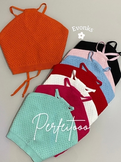 Perfeito para o verão! Este encantador Top Frente Único, traz um toque de charme e frescor , ideal para os dias ensolarados 