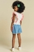 75865 - CONJUNTO INFANTIL DE BLUSA BOXY EM MALHA TEXTURA E SHORTS JEANS ARKANSAS + BOLSA - KUKIÊ - comprar online