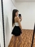 SHORT NEGRO CON FLECOS en internet