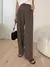 Pantalones de traje de talle alto con fruncido con bolsillo oblicuo en internet