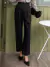 Pantalones de traje unicolor con fruncido