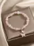 Pulsera con cuentas mariposa