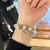Pulsera Hello Kitty con perlas y dijes - comprar en línea