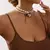 Collar elegante coquette de lazitos y perlas - tienda en línea