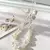 Keychain white coquette celular