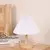 Lampara de mesa vintagede madera en internet