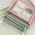 Binder con cierre + paquete de 10 micas - Nivalo Store