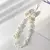 Keychain white coquette celular - comprar en línea