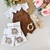 Romper Tricot Pompom - Marrom - comprar online