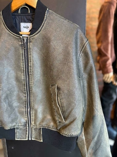 Campera dama pu reeb puño | NASA - Motivos Para Quedarte