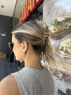 Broche dorado