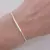 Bracelete fio detalhe tubo - comprar online
