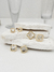 Brinco trevo transparente M - comprar online
