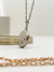 Relicário oval com strass na internet
