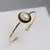 Pulseira folhado a ouro e rodio negro Perola Shell Branca - comprar online