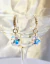 Aros Huggies Gota Glam Plata y Cistales de oriente - Andi Joyas 