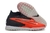 Chuteira Nike Phantom GX Elite Society TF
