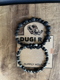 Pulsera de diseño con piedras naturales volcanicas y obsidianas, enhebradas sobre tanza elastica