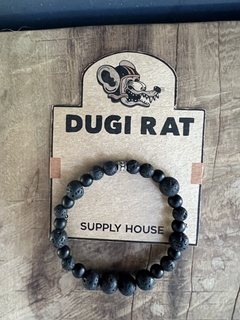 Pulsera de diseño con piedras naturales volcanicas y obsidianas, enhebradas sobre tanza elastica