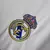 Imagem do Camisa Real de Madrid I 25/26 - Torcedor Adidas Masculina - Branca com detalhes em cinza e amarelo