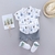 Conjunto bermuda gris con camisa teepees