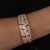 Bracelete Gold de Pena Cravejado de Zircônia - comprar online