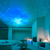 Projetor de Estrelas e Galáxia LED - Lâmpada Noturna Astronauta - Magic Haus