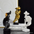 Estatueta do Silêncio Dourado - Decoração Residencial
