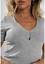 Remera botones