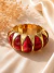 Bracelete acrílico dourado na internet