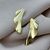 Brinco Asa Orgânico Banho de Ouro 18k - comprar online