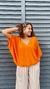Blusa goiaba laranja na internet