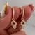 Argollas mano de Hamsa en internet