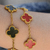 PULSERA TRÉBOL ROJA DUPE en internet