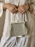 Bolsa de mão Ivory