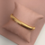 Pulseira Mola - banho ouro e ródio branco na internet