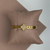 Pulseira Bracelete Trevo - Banhada a Ouro 18k na internet