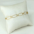 Pulseira dourada oval vazada - comprar online