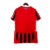 Camisa de futebol masculina torcedor Puma, modelo Home Milan 24/25, na cor preta e vermelha, com listras.